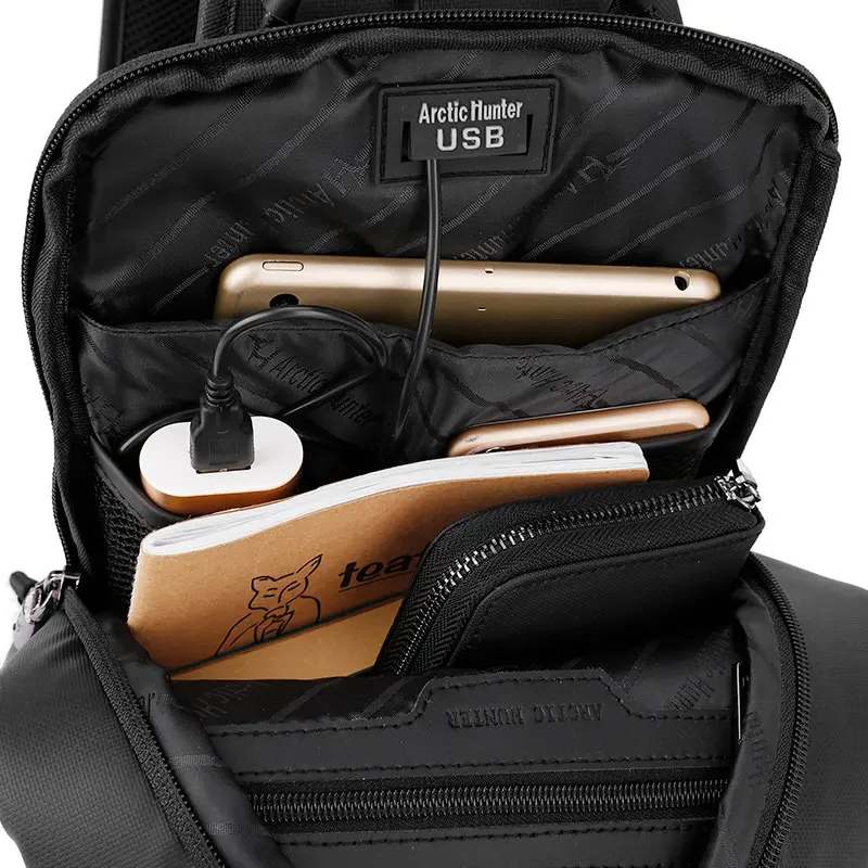 Arctic Hunter USB-s egypántos hátizsák, hátitáska, válltáska fekete színben mintás vízálló (XB130028-BLACK)